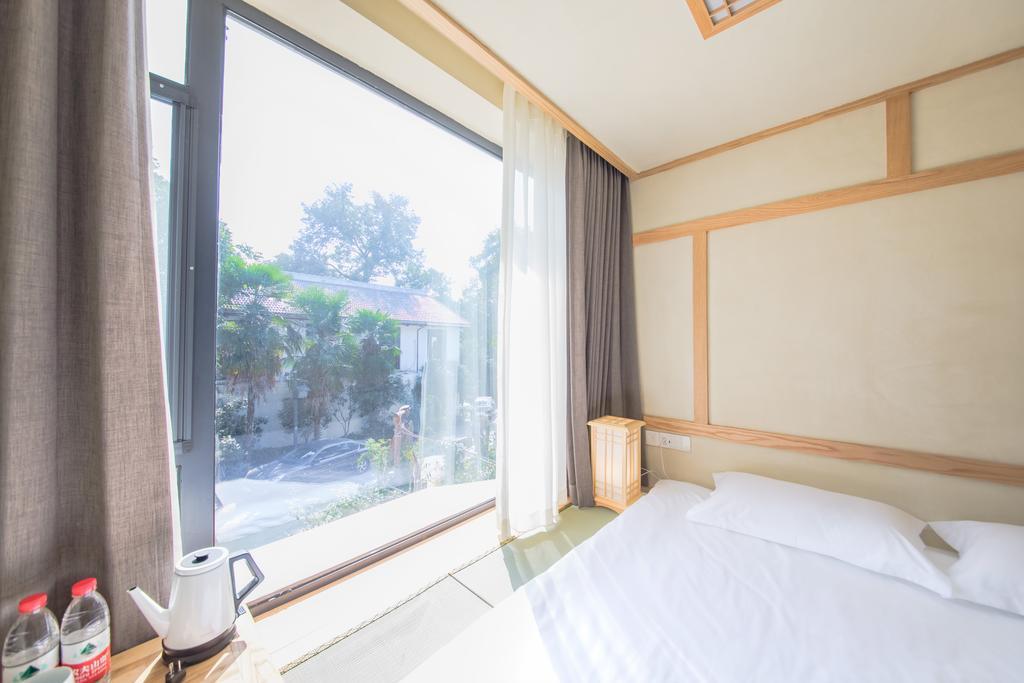 Hangzhou Van Wind Inn Экстерьер фото